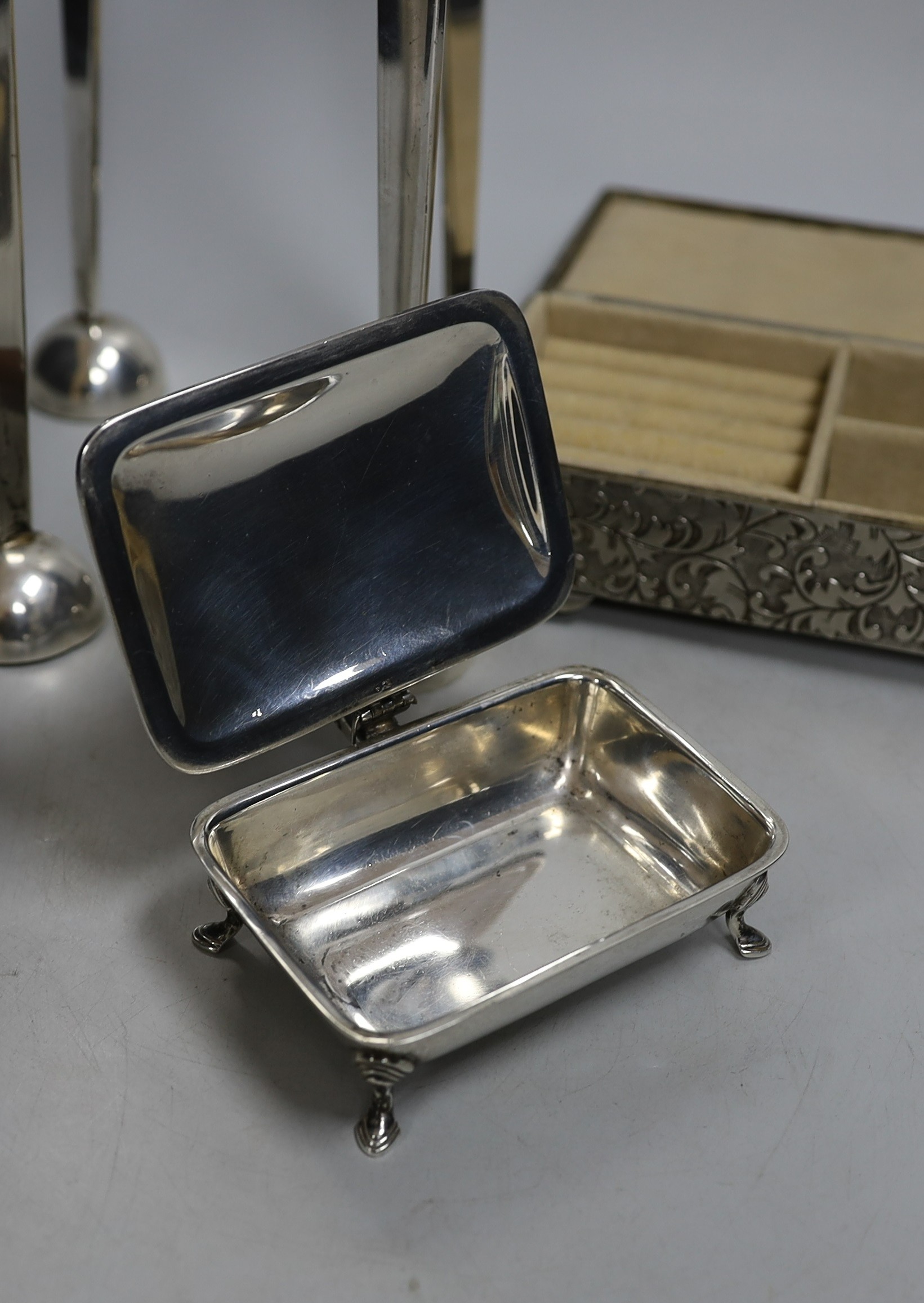 A silver-plated four sconce candelabrum, 28cms high and two other plated items
